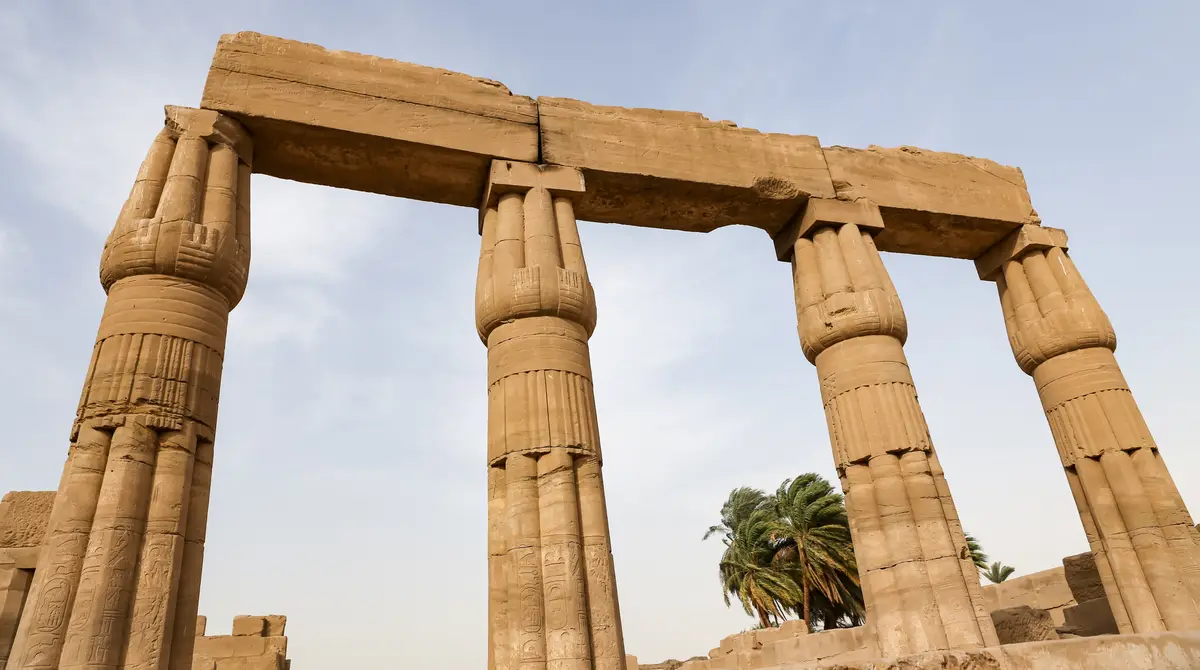 Massive ancient columns of the Karnak temple complex in Luxor, Egypt