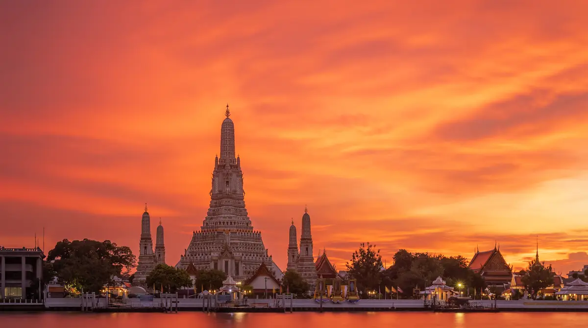 Ornate Buddhist temple with golden spires in Bangkok, Thailand